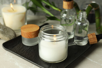 Concept of relaxation with aroma candles, close up