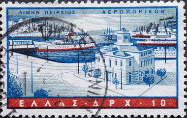 Greece - circa 1958: a postage stamp from Greece, showing a cityscape of the harbor - Piraeus in Athens