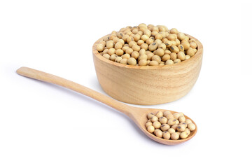 Soybeans in wooden bowl and spoon isolated on white background.