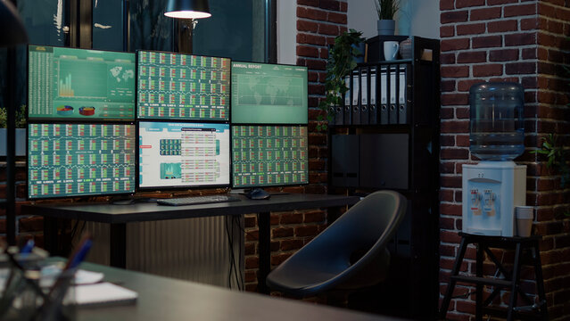 Nobody in empty space with digital stock market numbers on multi monitor, used for financial trading and capital sales. Technology with forex trade investment and hedge fund exchange.