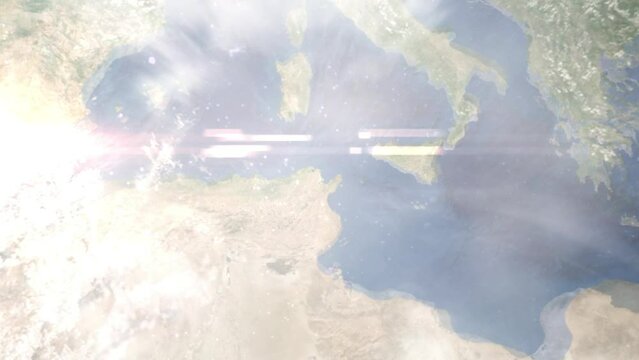 Earth zoom in from outer space to city. Zooming on Ariana, Tunisia. The animation continues by zoom out through clouds and atmosphere into space. Images from NASA