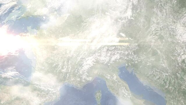 Earth zoom in from outer space to city. Zooming on Lucerne, Switzerland. The animation continues by zoom out through clouds and atmosphere into space. Images from NASA