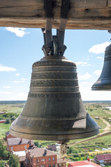 Fototapeta premium Cast-iron ancient bells of orthodox church, close up