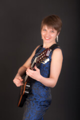 portrait of a woman with a guitar