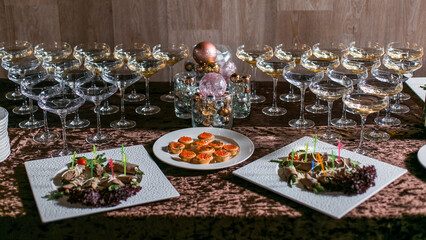 Decorated catering banquet table with different food appetizers assortment on a party