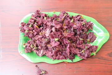 Red hibiscus flowers on a Wood background 