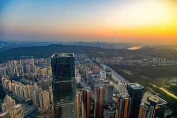 Fototapeta premium Cityscape of evening sunset in Nanning, Guangxi, China, viewed from above
