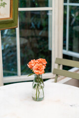 beautiful rose flower in vase decorated on table