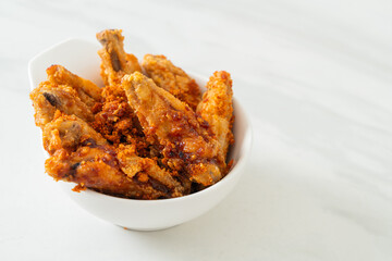 fried barbecue chicken wings in bowl