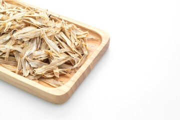 dried small crispy fish on white background