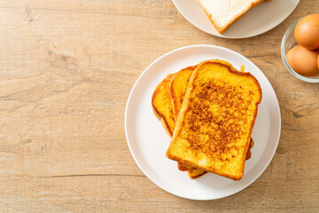 french toast on white plate