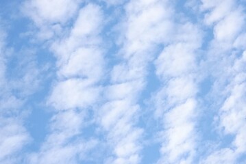 A beautiful fluffy clouds with blue sky in bright day for background backdrop