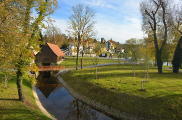 Fototapeta na wymiar Bad Kosen Germany historical mill well and river Saale panorama view