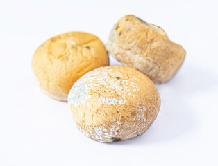 Picture of a pile of expired bread or dough contaminated with mold or bacteria that are harmful to health.