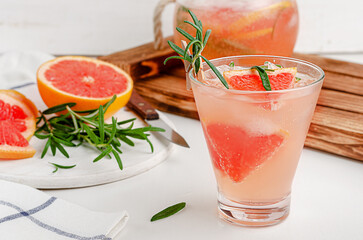 Homemade grapefruit mocktail with rosemary. Healthy summer beverage
