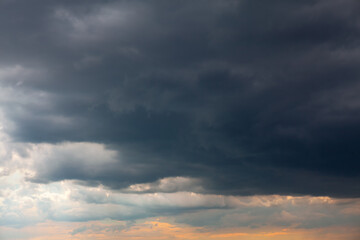 Obraz premium Contrast sky with black and white clouds 