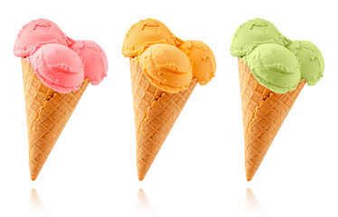 Set of differen flavors ice cream cones.