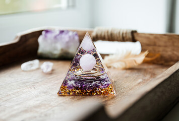 Small home altar with Orgonite or Orgone pyramid indoors. Converting negative energy to positive...