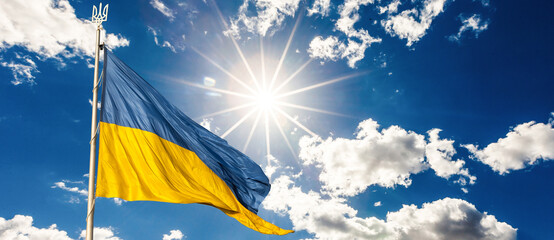 Ukrainian flag on blue sky backgroud