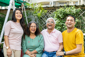 portrait of a happy family in a garden
