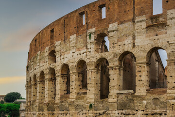 Rome, Italy Colosseum exterior view of the Flavian amphitheater upper columns without tourists,...