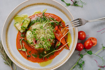 Tartare dish of vegetables red pepper, cucmber and tomato sauce