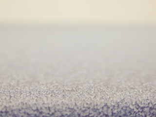 Snow ice texture. Thawed frost on a wooden board. wooden planks cowered with melting snow. Winter nature background of fluffy white snow