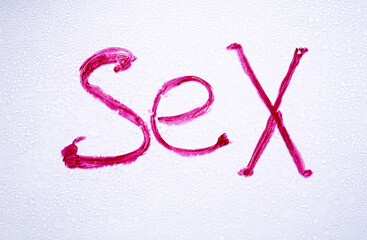 word sex  written in red lipstick