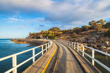 Fototapeta premium Granite island viewed from the causeway at sunset time, Victor Harbor, Fleurieu Peninsula, South Australia