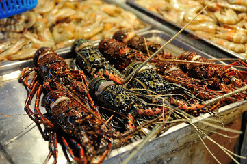 Fresh lobsters for sale at traditonal market in Coron, Philippines. 
