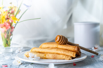 appetizing pancakes on white plate, good morning, spring breakfast concept