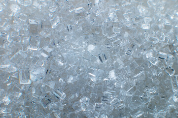 Sugar crystals. Great zoom, extreme macro. For illustration, texturing and collage. Sugar in shallow depth of field
