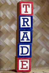 trade text on wooden block written vertical 