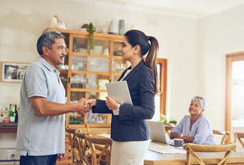 Lets talk about creating a safe retirement for you. Shot of a mature couple meeting with their...