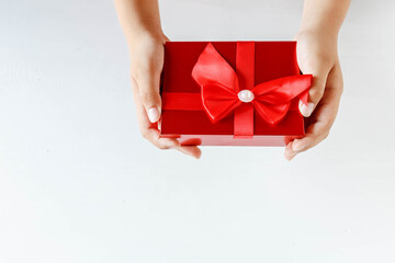 Red gift box in hand