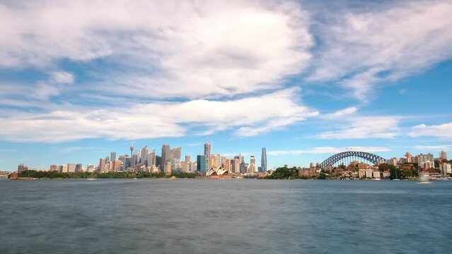 Slow zoom time lapse across Sydney harbour toward Opera House