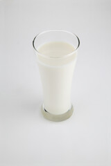 Glass of milk isolated on white background