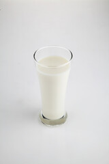 Glass of milk isolated on white background