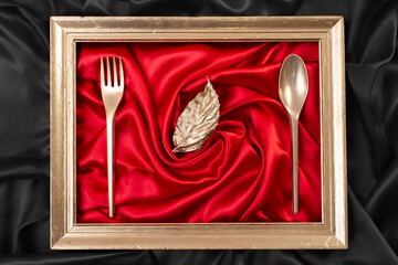 dining background concept with red satin and golden frame