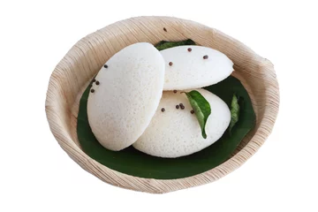 Fotobehang Idly , Idli is a traditional breakfast of South India served in organic plate & banana leaf © SMD IMAGES