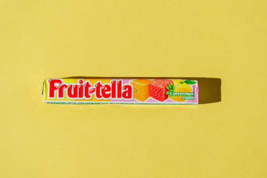 Tyumen, Russia-April 03, 2022: Fruittella chery sweet made by Perfetti Van Melle, on a yellow background