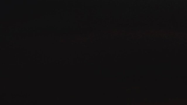 The red sky fades to night.  Time lapse