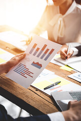 The financiers are calculating personal taxes for their customers.