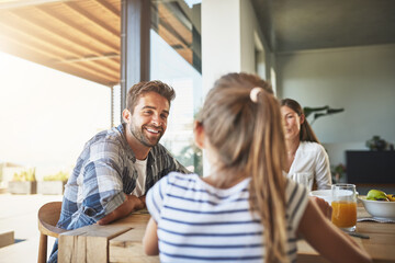 Obraz premium Having breakfast together makes them a happier family. Shot of a family having breakfast together at home.