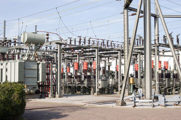 Fototapeta na wymiar Closeup of high voltage electrical components of an substation in Nijmegen in the Netherlands