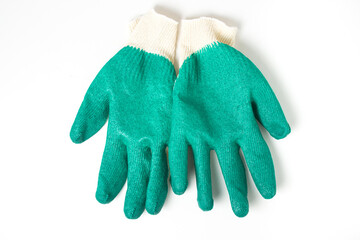 Rubberized fabric gloves on a white background. Gloves for working in the garden.