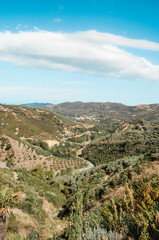Fototapeta na wymiar Landscape with roads among green hills, Crete.