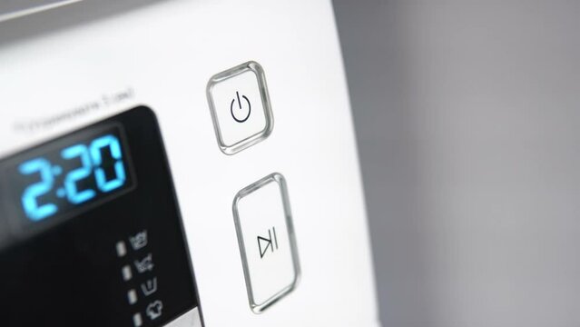 Finger press the switch to make the washing machine work. Home appliances