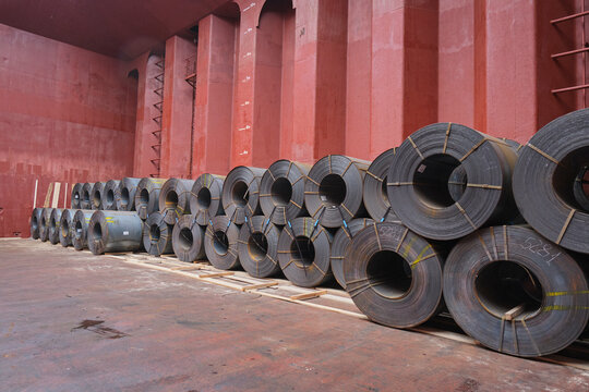 Stowage of hot rolled steel coils inside ship's cargo hold, lashing, wooden dunnage
