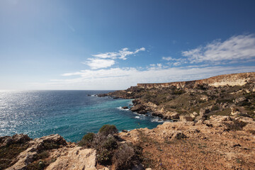 Fototapeta na wymiar Panoramic scenic view of the coast of Malta. Discovering Malta island, Europe. Hiking in Malta. Active life in Malta